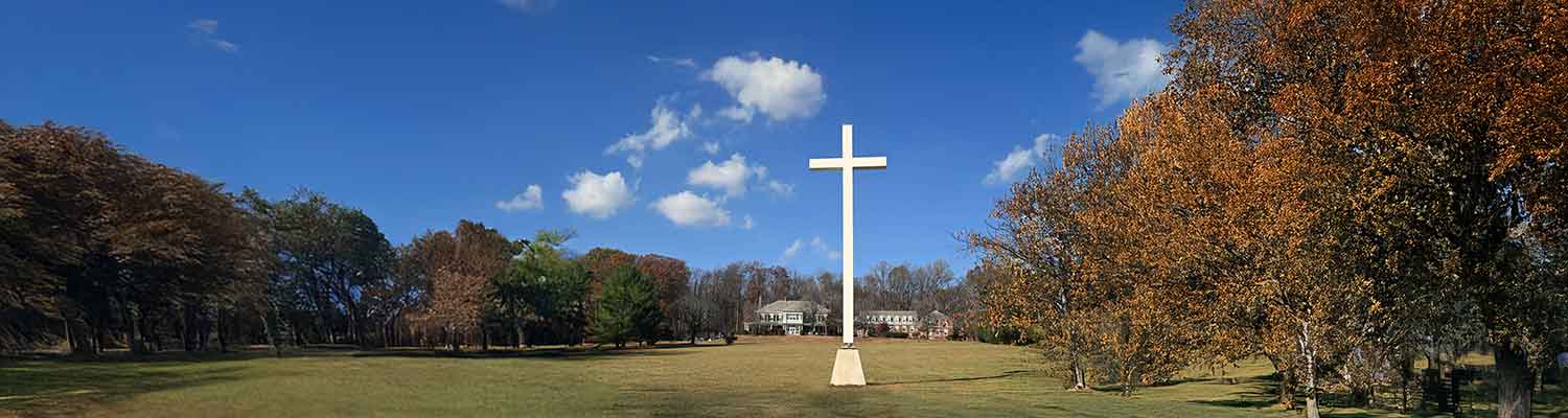 The Papal Cross standing on the lawn at Malvern Retreat House
